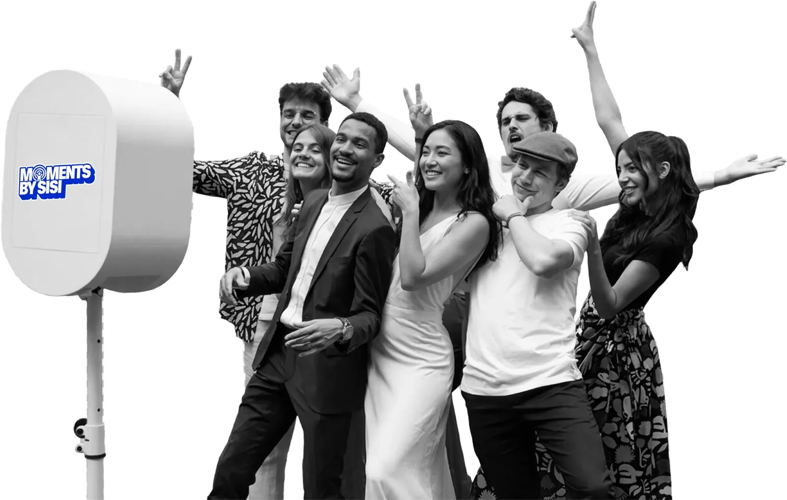 Friends celebrating next to the Moments By Sisi photobooth